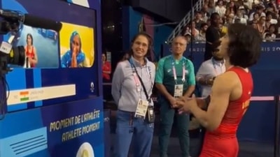 Vinesh Phogat during a video call with her mother after winning semifinal bout Vinesh Phogat during a video call with her mother after winning semifinal bout