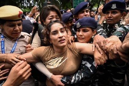 Wrestler Vinesh Phogat was detained by the police while attempting to march to the new parliament building in New Delhi on May 28, 2023. (AFP) Wrestler Vinesh Phogat was detained by the police while attempting to march to the new parliament building in New Delhi on May 28, 2023. (AFP)