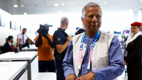 Bangladesh News LIVE: Nobel laureate Muhammad Yunus, who was recommended by Bangladeshi student leaders as the head of the interim government in Bangladesh, stands at Paris Charles de Gaulle airport in Roissy-en-France, France August 7, 2024. 