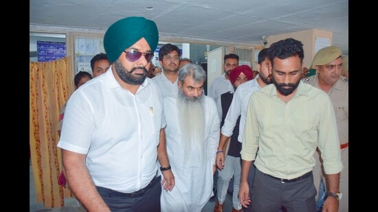 Former Punjab minister Bharat Bhushan Ashu being taken to a court in Jalandhar on Wednesday.