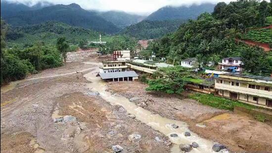 Houses got partially submerged in mud and sludge following landslide, in Wayanad. (ANI)