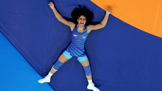 India's Vinesh Phogat reacts after winning the round of 16 women's 50kg wrestling match against Japan's Yui Susaki