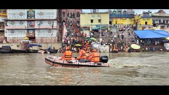 NDRF teams patrol the Ganga in Varanasi on Wednesday. (Rajesh kumar/HT)