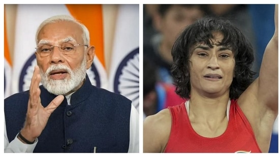 Prime Minister Narendra Modi and wrestler Vinesh Phogat.(PTI)