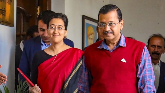 Delhi finance minister Atishi with chief minister Arvind Kejriwal.(PTI)