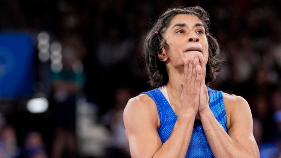 India's Vinesh Phogat reacts after the round of 16 of the women's freestyle 50kg wrestling match against Japan's Yui Susaki, at Champ-de-Mars Arena, during the 2024 Summer Olympics, Tuesday, Aug. 6, 2024, in Paris(PTI)