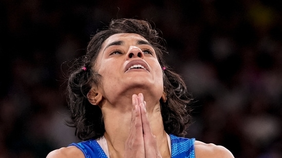 India's Vinesh Phogat reacts after the round of 16 of the women's freestyle 50kg wrestling match against Japan's Yui Susaki, at Champ-de-Mars Arena, during the 2024 Summer Olympics, Tuesday, Aug. 6, 2024, in Paris, France.(PTI)