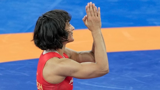 Paris: India's Vinesh Phogat celebrates after winning her Women's Freestyle 50kg semi-final wrestling match against Cuba's Yusneylys Guzman Lopez at the 2024 Summer Olympics, in Paris.(PTI)