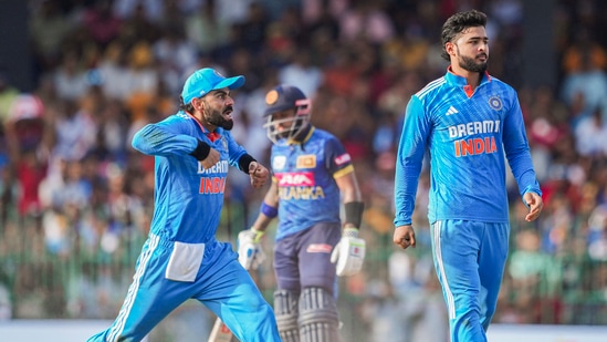 India's Riyan Parag (R) and Virat Kohli celebrate the wicket of Sri Lanka's Charith Asalanka.(PTI)