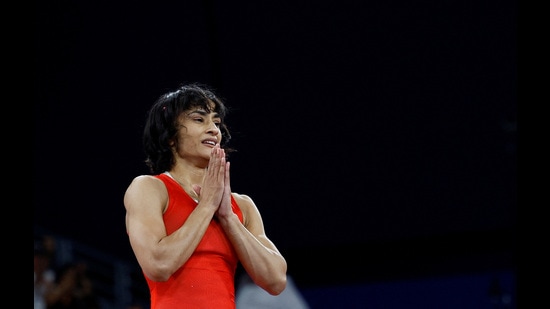 Paris 2024 Olympics - Wrestling - Women's Freestyle 50kg Semifinal - Champ-de-Mars Arena, Paris, France - August 06, 2024. Vinesh Phogat of India reacts after winning the match against Yusneylis Guzman Lopez of Cuba. REUTERS/Kim Kyung-Hoon (REUTERS)