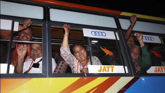 Pilgrims shout religious slogans as they leave for Poonch in the first batch of Budha Amarnath Yatra. (PTI)