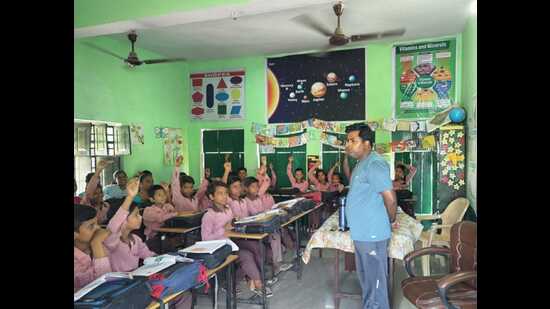 Students in a government-run primary school in Prayagraj (HT FIle)