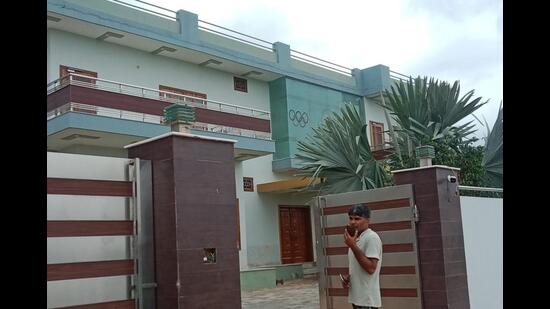 The house of wrestler Vinesh Phogat wears a deserted look at Balali village in Charkhi Dadri district in Haryana on Wednesday afternoon. (HT Photo)