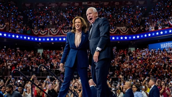 Democratic presidential candidate, U.S. Vice President Kamala Harris and Democratic vice presidential nominee Minnesota Gov. Tim Walz walk out on stage together during a campaign event on August 6, 2024 in Philadelphia, Pennsylvania. (Photo by Andrew Harnik / GETTY IMAGES NORTH AMERICA / Getty Images via AFP)(Getty Images via AFP)