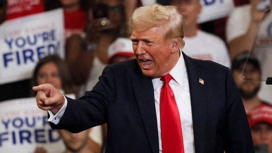 Former US President and 2024 Republican presidential candidate Donald Trump arrives to speak during a campaign rally at the Georgia State University Convocation Center in Atlanta, Georgia, on August 3, 2024. (Photo by CHRISTIAN MONTERROSA / AFP)(AFP)