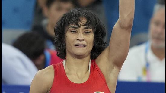 Vinesh Phogat celebrating after winning her Women's Freestyle 50kg semi-final wrestling match. (PTI)