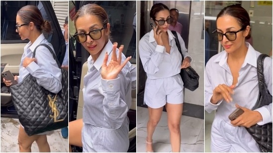 Malaika Arora was the picture of uber elegance and comfort in a pinstriped blue crop shirt and matching shorts. She wore the ensemble during an outing. Sunglasses, a YSL tote bag, nude pink block heels, minimal makeup, and a centre-parted bun rounded off the look. (Instagram)