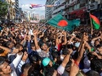 People gather in front of the Bangladesh Nationalist Party (BNP) headquarters during a rally in Dhaka, Bangladesh. (AP) People gather in front of the Bangladesh Nationalist Party (BNP) headquarters during a rally in Dhaka, Bangladesh. (AP)