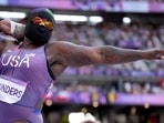 Raven Saunders, of the United States, competes during the women's shot put qualification at the 2024 Summer Olympics, Thursday, Aug. 8, 2024, in Saint-Denis, France. (AP Photo/Bernat Armangue)
