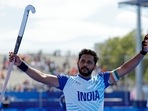 Harmanpreet Singh of India celebrates winning the match