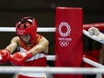 Indian boxer Mary Kom in action at the 2020 Summer Olympics. Indian boxer Mary Kom in action at the 2020 Summer Olympics.