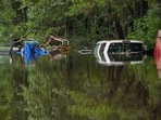 Trucks are submerged after excessive rains caused flooding on August 7, 2024 in Statesboro, Georgia.. Tropical Storm Debby has stalled over the South East it is predicted to drop 10-20 inches of rain in the next couple days. Megan Varner/Getty Images/AFP (Photo by Megan Varner / GETTY IMAGES NORTH AMERICA / Getty Images via AFP) Trucks are submerged after excessive rains caused flooding on August 7, 2024 in Statesboro, Georgia.. Tropical Storm Debby has stalled over the South East it is predicted to drop 10-20 inches of rain in the next couple days. Megan Varner/Getty Images/AFP (Photo by Megan Varner / GETTY IMAGES NORTH AMERICA / Getty Images via AFP)