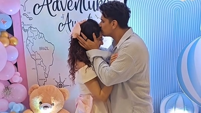 At the party, Prince Narula also kissed Yuvika Chaudhary on her forehead as she smiled. At the party, Prince Narula also kissed Yuvika Chaudhary on her forehead as she smiled.