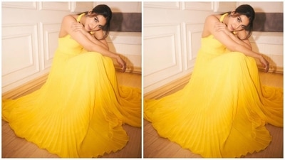 Vaani's dress, in a trendy butter yellow shade, features a sweetheart halter neckline, backless detailing, and a beautiful flare at the bottom, exuding oomph and elegance. (Instagram) Vaani's dress, in a trendy butter yellow shade, features a sweetheart halter neckline, backless detailing, and a beautiful flare at the bottom, exuding oomph and elegance. (Instagram)