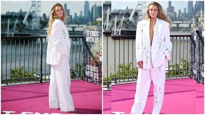 Blake Lively is still all about method dressing, and her latest look is proof of that. She rocked a chic white blazer with green floral prints, daringly worn without a shirt underneath. Paired with matching pants and statement earrings, she absolutely nailed the pantsuit vibe. (Instagram) Blake Lively is still all about method dressing, and her latest look is proof of that. She rocked a chic white blazer with green floral prints, daringly worn without a shirt underneath. Paired with matching pants and statement earrings, she absolutely nailed the pantsuit vibe. (Instagram)