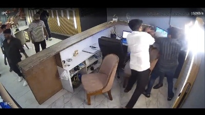 A screen grab from CCTV footage shows men thrashing a cafe worker (HT Photo)