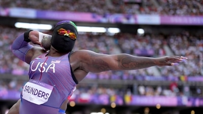 Raven Saunders, of the United States, competes during the women's shot put qualification at the 2024 Summer Olympics, Thursday, Aug. 8, 2024, in Saint-Denis, France. (AP Photo/Bernat Armangue) (AP) Raven Saunders, of the United States, competes during the women's shot put qualification at the 2024 Summer Olympics, Thursday, Aug. 8, 2024, in Saint-Denis, France. (AP Photo/Bernat Armangue) (AP)