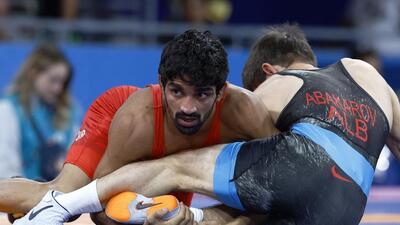 Aman Sehrawat of India in action against Zelimkhan Abakarov of Albania. (REUTERS)