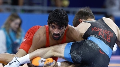 Aman Sehrawat scythed through his first two bouts in the men's 57kg wrestling, winning them by technical superiority. However, he then lost his semifinal bout by technical superiority later in the day and will now fight for bronze on Friday. (HT_PRINT) Aman Sehrawat scythed through his first two bouts in the men's 57kg wrestling, winning them by technical superiority. However, he then lost his semifinal bout by technical superiority later in the day and will now fight for bronze on Friday. (HT_PRINT)