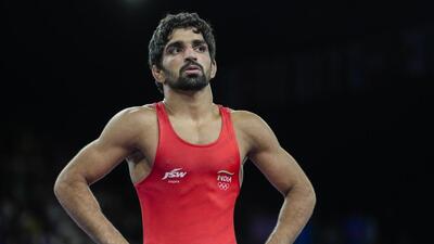 India's Aman Sehrawat during his men's freestyle 57kg wrestling quarterfinal win over Albania's Zelimkhan Abakarov at the Paris Olympics on Thursday. (PTI) India's Aman Sehrawat during his men's freestyle 57kg wrestling quarterfinal win over Albania's Zelimkhan Abakarov at the Paris Olympics on Thursday. (PTI)