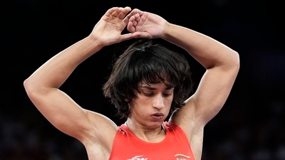 India's Vinesh Phogat during the women's freestyle 50kg quarterfinal wrestling match. (PTI) India's Vinesh Phogat during the women's freestyle 50kg quarterfinal wrestling match. (PTI)