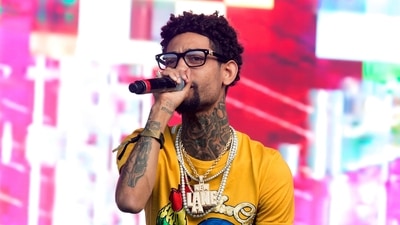 FILE - Philadelphia rapper PnB Rock performs at the 2018 Firefly Music Festival in Dover, Del., June 16, 2018. (Owen Sweeney/Invision/AP) FILE - Philadelphia rapper PnB Rock performs at the 2018 Firefly Music Festival in Dover, Del., June 16, 2018. (Owen Sweeney/Invision/AP)
