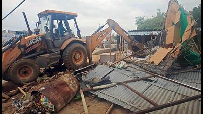 The Gurugram Metropolitan Development Authority’s (GMDA) enforcement wing successfully carried out a two-day demolition drive, removing illegal structures and encroachments found along the green belts and master roads of several sectors in Gurugram. (HT PHOTO.)