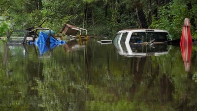 Trucks are submerged after excessive rains caused flooding on August 7, 2024 in Statesboro, Georgia.. Tropical Storm Debby has stalled over the South East it is predicted to drop 10-20 inches of rain in the next couple days.   Megan Varner/Getty Images/AFP (Photo by Megan Varner / GETTY IMAGES NORTH AMERICA / Getty Images via AFP) (Getty Images via AFP)