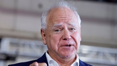 Tim Walz said he carried weapons ‘in war' in resurfaced clip (Photo by JEFF KOWALSKY / AFP) (AFP) Tim Walz said he carried weapons ‘in war' in resurfaced clip (Photo by JEFF KOWALSKY / AFP) (AFP)