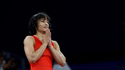 Vinesh Phogat of India reacts after winning the match against Yusneylis Guzman Lopez of Cuba at the Women’s Freestyle 50kg semifinal at Champ-de-Mars Arena during the Paris Olympics on August 6. (Reuters)