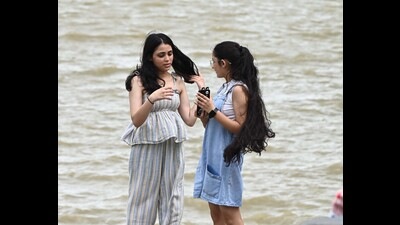 Visitors at Sukhna Lake in Chandigarh on a humid Thursday evening. (Keshav Singh/HT)