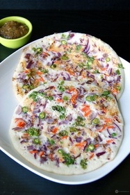 Onion uttapam is a savoury south Indian pancake topped with caramelised onions and spices. (Pinterest) Onion uttapam is a savoury south Indian pancake topped with caramelised onions and spices. (Pinterest)