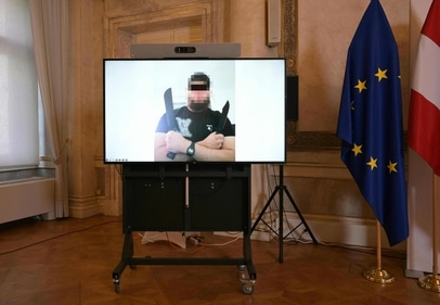 A screen displays a photo of a man arrested in connection with an Islamist attack plot that caused the cancellation of the Vienna leg of a tour by American mega-star Taylor Swift, on the sidelines of a press conference on August 8, 2024 at the Foreign Ministy in Vienna, Austria. A 19-year-old IS sympathiser was planning a suicide attack at a Taylor Swift concert in Vienna designed to kill many people, the intelligence agency said. (AFP) A screen displays a photo of a man arrested in connection with an Islamist attack plot that caused the cancellation of the Vienna leg of a tour by American mega-star Taylor Swift, on the sidelines of a press conference on August 8, 2024 at the Foreign Ministy in Vienna, Austria. A 19-year-old IS sympathiser was planning a suicide attack at a Taylor Swift concert in Vienna designed to kill many people, the intelligence agency said. (AFP)