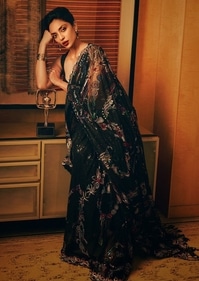 Sobhita Dhulipala stuns in a black net saree with intricate sequin work (Photo: Instagram) Sobhita Dhulipala stuns in a black net saree with intricate sequin work (Photo: Instagram)