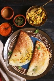 Paneer uttapam is a fluffy South Indian pancake loaded with flavourful paneer chunks and spices, offering a deliciously creamy twist. (Pinterest) Paneer uttapam is a fluffy South Indian pancake loaded with flavourful paneer chunks and spices, offering a deliciously creamy twist. (Pinterest)
