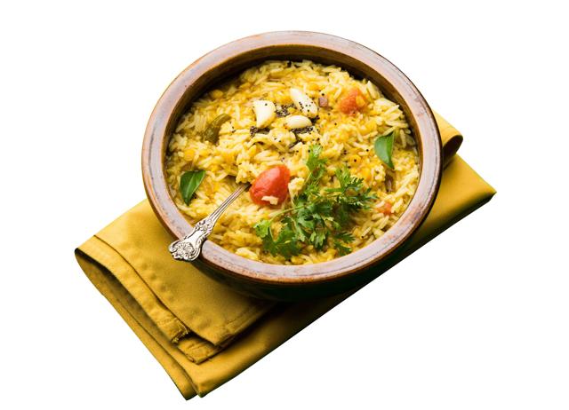 The first meal I eat when I arrive back from another country is always a khichdi with ghee. (ADOBE STOCK) The first meal I eat when I arrive back from another country is always a khichdi with ghee. (ADOBE STOCK)