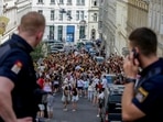Austrian police officers watch swifts gathering in the city centre in Vienna on Thursday, Aug.8, 2024. Organizers of three Taylor Swift concerts in the stadium in Vienna this week called them off on Wednesday after officials announced arrests over an apparent plot to launch an attack on an event in the Vienna area such as the concerts. (AP Photo/Heinz-Peter Bader)(AP) Austrian police officers watch swifts gathering in the city centre in Vienna on Thursday, Aug.8, 2024. Organizers of three Taylor Swift concerts in the stadium in Vienna this week called them off on Wednesday after officials announced arrests over an apparent plot to launch an attack on an event in the Vienna area such as the concerts. (AP Photo/Heinz-Peter Bader)(AP)
