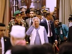 Nobel laureate Muhammad Yunus salutes to the attendees upon arrival at the Bangabhaban to take oath as the head of the interim government, in Dhaka, Bangladesh, August 8, 2024. REUTERS/Mohammad Ponir Hossain