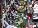 Mumbai, India - September 01, 2021: Hawkers sell fruits and vegetables by encroaching the road leading to traffic congestion and difficulty in walking at Vile Parle Market, in Mumbai, India, on Wednesday, September 01, 2021. (Photo by Vijay Bate/HT Photo) (HT PHOTO) Mumbai, India - September 01, 2021: Hawkers sell fruits and vegetables by encroaching the road leading to traffic congestion and difficulty in walking at Vile Parle Market, in Mumbai, India, on Wednesday, September 01, 2021. (Photo by Vijay Bate/HT Photo) (HT PHOTO)