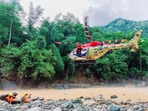 Teams of Special Operations Group and IAF, along with one Cadavar dog being airlifted during a search and rescue operation underway at a landslide-hit area in Wayanad.(PTI) Teams of Special Operations Group and IAF, along with one Cadavar dog being airlifted during a search and rescue operation underway at a landslide-hit area in Wayanad.(PTI)
